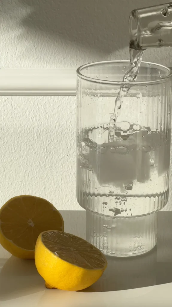 water being poured with lemon